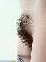 Sati strips naked in bed to read her green book